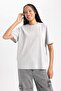 تي شيرت بأكمام قصيرة وياقة دائرية كبيرة الحجم B0648AXNS - 3