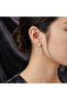 Gold Tone Geometric Drop Earrings – Cushion Stone + Sparkling Oval Frame