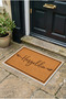 Welcome Written on the Door Mat with Minimal Text