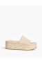 SUEDE WEDGE MULE IN NATURAL