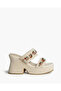 BRAIDED WEDGE IN BEIGE