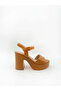 SANDALS IN HAVANE