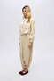 سترة نسائية عصرية ذات لون موحد مع سحاب وحزام خصر قابل للتعديل - 4