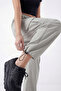 Women's Gray Oversize Parachute Fabric Cargo Pants with Pockets, Adjustable Leg Clips, Baggy Pants - 3
