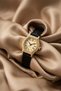 Retros Water-Resistant Women's Wristwatch - Vintage Oval Case with Gold Detail Black Leather Strap Stone Watch