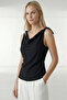 Plunging Neck Sleeveless Blouse