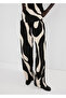 Patterned trousers with straight cut