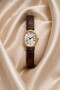 Misky Gold Oval Case Roman Numeral Leather Brown Strap Stylish & Elegant Women's Wristwatch