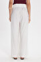Women's relaxed fit white trousers with elastic waistband - 6