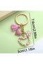 Heart-Shaped Keychain with Tassels – Stylish Bag Accessory with Floral and Pearl Detailing - 4