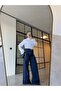 Design Jean with Gold Accessories - 7