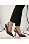Women's pointed ankle-strap heels in burgundy patent leather