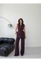 Stylish and Modern Two-Piece Set Featuring a Sleeveless Long Vest and High-Waisted Pants. - 4