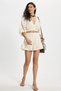 Women's Oversize Wide Cut 100% Cotton Double Breasted Collar Crop Ruffle Ecru Shorts Skirt Set - 8