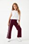 Bordo Pamuklu Kız Çocuk Biye Detaylı Esnek Wide Leg/Geniş Paça Örme Pantolon TKDSS25PL00015