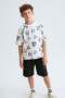تي شيرت للأولاد من 8 إلى 16 سنة بأكمام قصيرة ونقشة مميزة، لون إكرو - 2