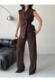 Stylish and Modern Two-Piece Set Featuring a Sleeveless Long Vest and High-Waisted Pants. - 3