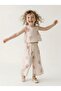 Cotton Flower-Patterned Bluse with Ruffle Details on the Sides and Wide-Leg Pants Girls' Two-Piece Set