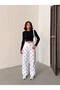 White Linen Pants with Polka Dots and Wide Legs - 3