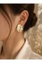 ✨   The Radiance of Natural Elegance: Gold Patterned Oval Earrings ✨