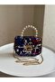 حقيبة أطفال صغيرة الحجم مزينة بالترتر ومقبض من اللؤلؤ