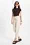 Women's relaxed fit soft-touch stone washed jeans with elastic waistband and double pockets. - 3