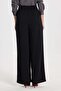 Women's relaxed fit black pants with gold button detail and double pockets - 6