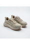 Woman's stone-studded sneaker