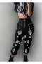 Pantaloni negri cu model stea