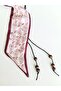 The Stylish Patterned Scarf Belt Adds an Original Touch to Summer Outfits with Wooden Bead Details and a Soft Texture.