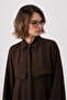 Covered Ferace Brown