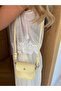 Yellow mini bag with knotted strap and lid - 3
