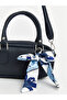 Leather-look women's shoulder bag with scarf detail - 4