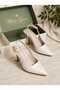Women's High-Heeled Shoes with Open Back and Buckle Detail. White Pearlescent Women's Stilettos.