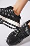 Vakos women's black sneakers with side stripe detail - 5