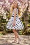 Girl's White Dress with Spotted Pattern on the Skirt and Rose Brooch on the Sleeves - 5