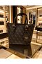 women hand and shoulder bag