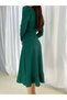 Women's green crepe midi dress with belt and long sleeves