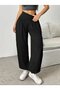 Women's high-waisted, wide-leg viscose pants with drawstring waist and pockets. - 5