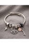 Steel Charm Bracelet with Eye-Puppet Design