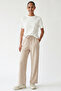 Regular Knitted Trousers with Elastic Waistband and Lace-Up Pockets - 7