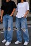 Unisex Light Blue Ripped Detailed Baggy Jean Trousers