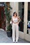 Women's Two-Piece Set: Crop Top with Integrated Straps and Wide-Leg Pants with Integrated Detailing