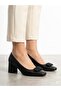 Woman's black thick heel bow detailed high heeled shoe