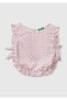 Girl's powder pink ruffle detail round neck blouse with bow accents on the sides