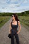 بلوزة بوليستر منقطة باللون الأسود
