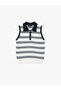 بلوزة تريكو بدون أكمام بياقة بولو مخططة وأزرار