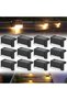 A set of 12 solar-powered outdoor lights, waterproof design, suitable for gardens, patios and walkways, warm white light.