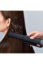 This heated curling iron features 3 temperature settings for curling and straightening hair. It is ergonomically designed and portable. - 3