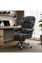 This home office/gaming chair is ergonomically designed with a footrest, adjustable backrest, padded armrests, and adjustable headrest and lumbar support. - 8